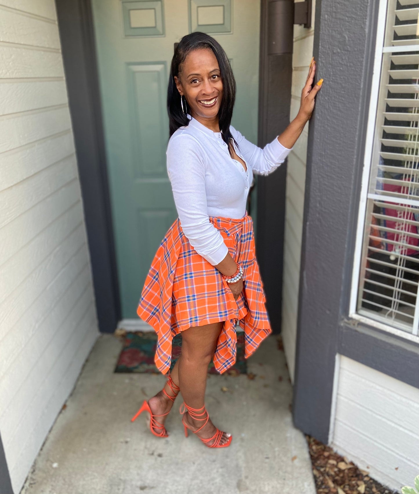 Faux sleeved plaid mini skirt