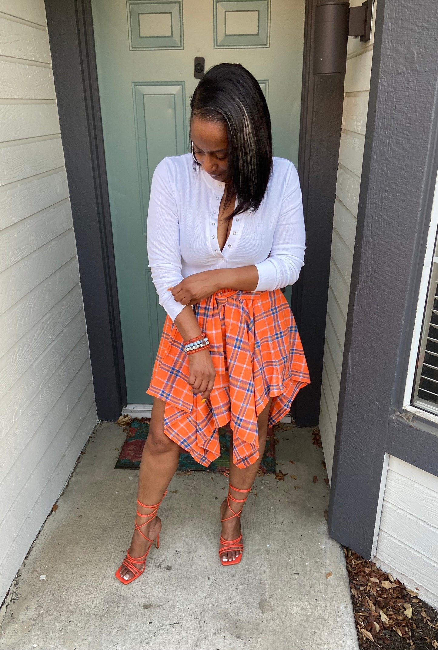 Faux sleeved plaid mini skirt