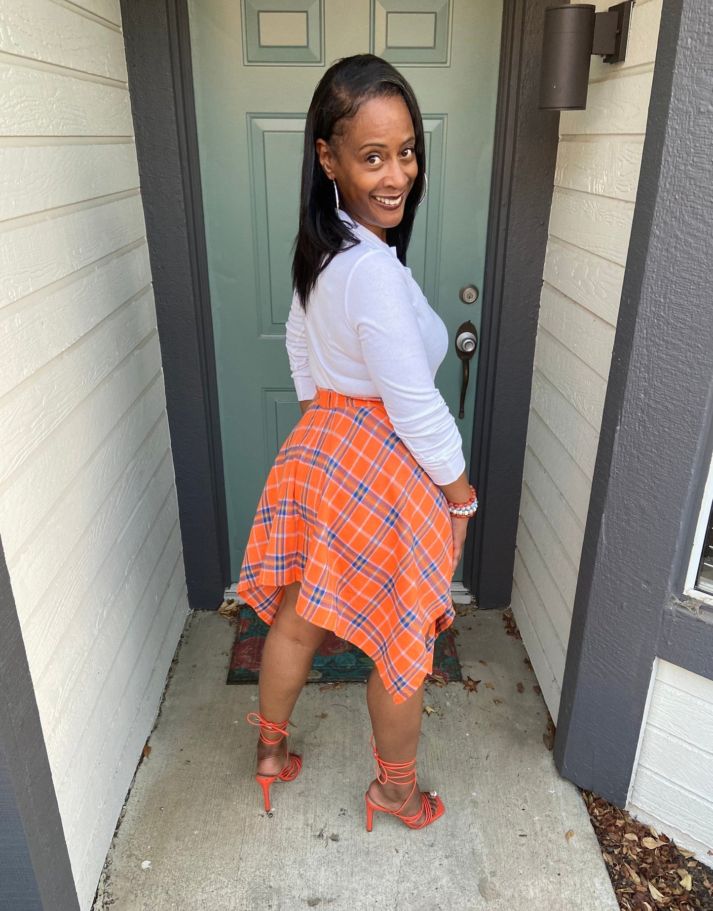 Faux sleeved plaid mini skirt